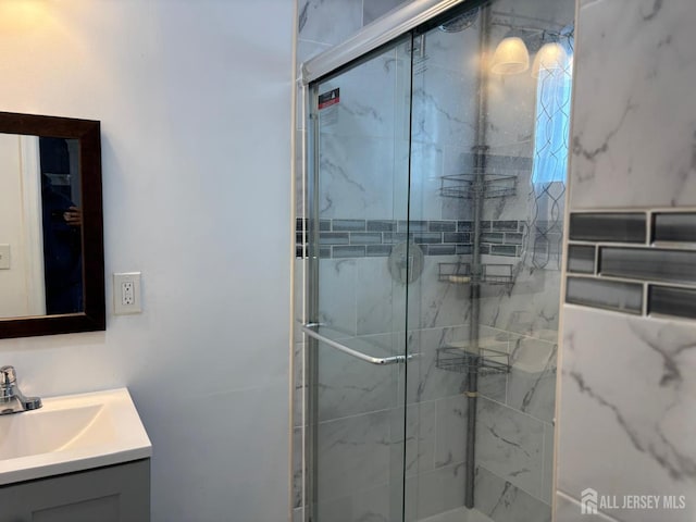 220 S Washington Ave, Dunellen, NJ 08812 - bathroom featuring vanity and a marble finish shower