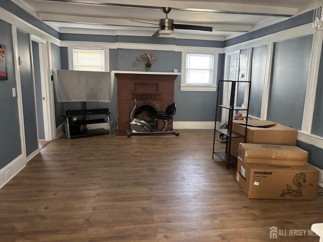 220 S Washington Ave, Dunellen, NJ 08812 - living area with beam ceiling, a ceiling fan, wood finished floors, and a fireplace
