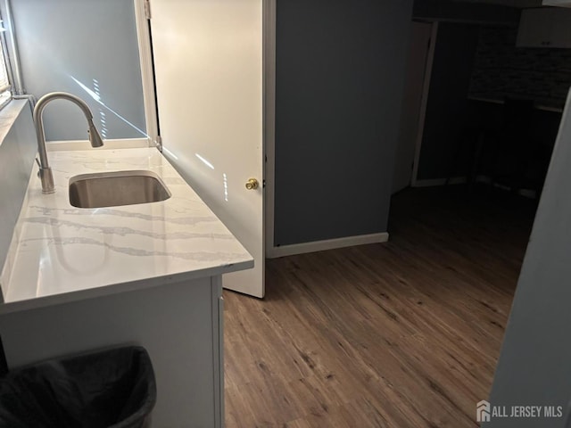 220 S Washington Ave, Dunellen, NJ 08812 - kitchen with wood finished floors and light countertops