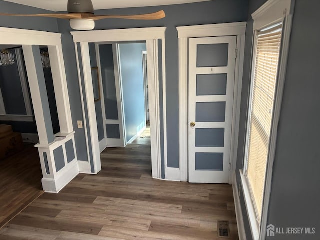 220 S Washington Ave, Dunellen, NJ 08812 - corridor featuring wood finished floors and baseboards