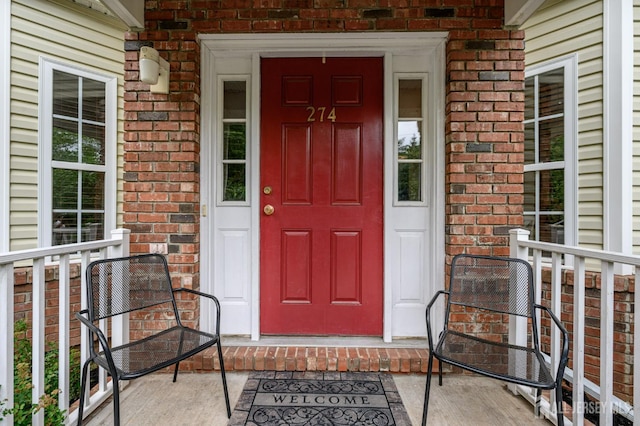 274 Pinelli Dr, Piscataway, NJ 08854 - entrance to property with brick siding and a porch