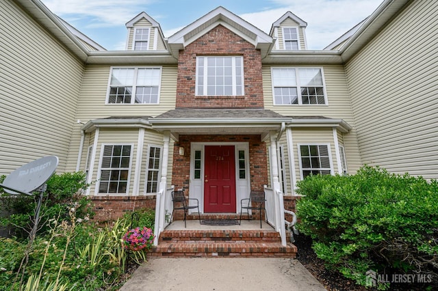 274 Pinelli Dr, Piscataway, NJ 08854 - doorway to property with brick siding