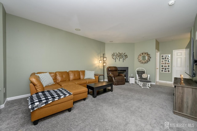 274 Pinelli Dr, Piscataway, NJ 08854 - carpeted living room featuring baseboards and a fireplace