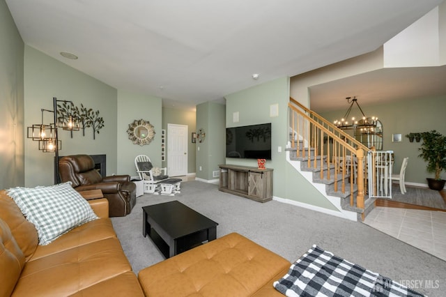 274 Pinelli Dr, Piscataway, NJ 08854 - carpeted living area featuring a chandelier and stairway