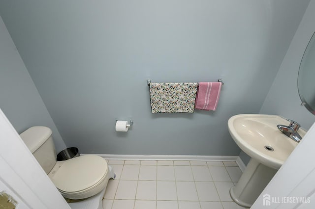 274 Pinelli Dr, Piscataway, NJ 08854 - half bathroom with baseboards and tile patterned flooring