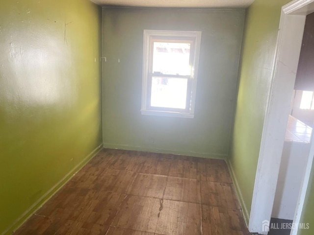 170 Rutgers St, New Brunswick, NJ 08901 - empty room with wood-type flooring and baseboards