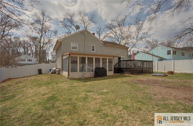 182 Columbia Ave, North Plainfield, NJ 07060 - back of house featuring a sunroom and a wooden deck