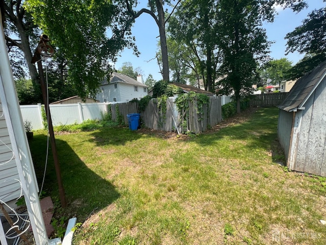 35 Orchard St, Metuchen, NJ 08840 - fenced backyard featuring a storage unit