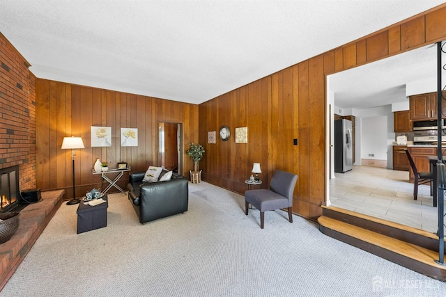 85 Hidden Lake Dr, North Brunswick, NJ 08902 - living room featuring light carpet, a brick fireplace, and wooden walls