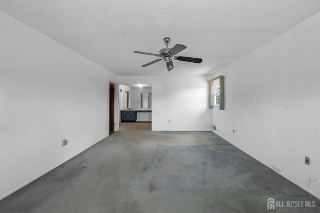 85 Hidden Lake Dr, North Brunswick, NJ 08902 - carpeted spare room featuring ceiling fan and a textured ceiling