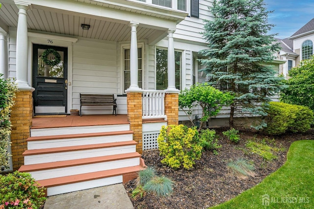entrance to property with covered porch