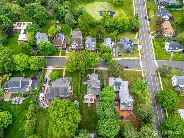 aerial overview of property's location with nearby suburban area