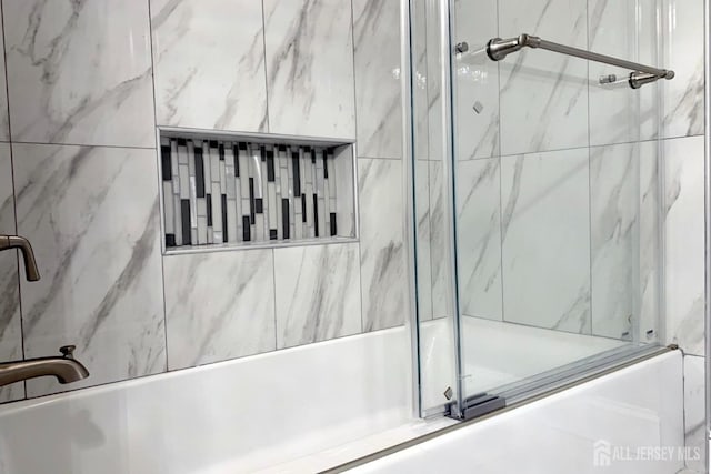 bathroom with a washtub and an enclosed shower