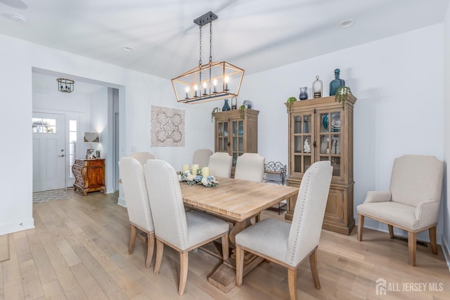 85 Valentino Dr, Old Bridge, NJ 08875 - dining room with a chandelier and light wood-style flooring