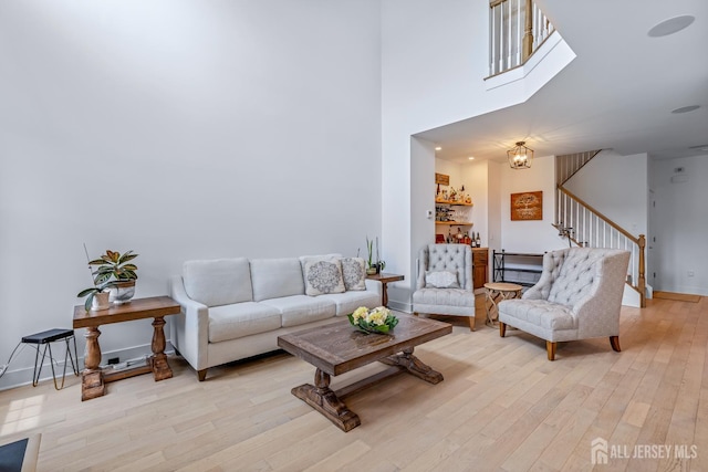 85 Valentino Dr, Old Bridge, NJ 08875 - living room with light wood-style flooring, stairs, and a high ceiling