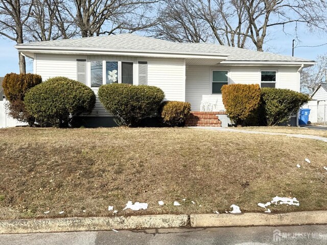 view of front of home with a front lawn