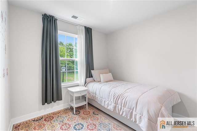1604 English Ln, Sayreville, NJ 08859 - bedroom with wood finished floors and baseboards