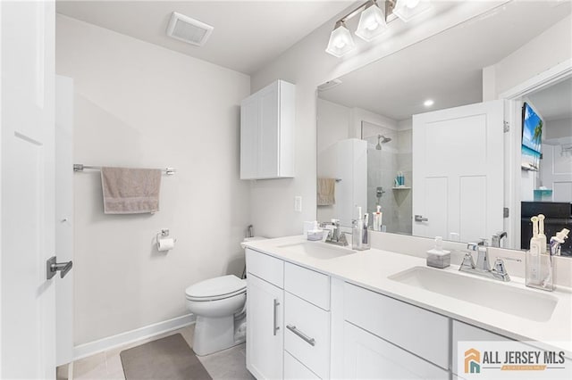 1604 English Ln, Sayreville, NJ 08859 - full bath with a tile shower, double vanity, and tile patterned floors
