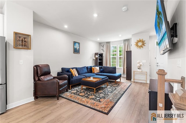 1604 English Ln, Sayreville, NJ 08859 - living room with light wood-style flooring and recessed lighting