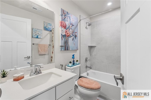 1604 English Ln, Sayreville, NJ 08859 - bathroom featuring vanity, bathing tub / shower combination, and recessed lighting