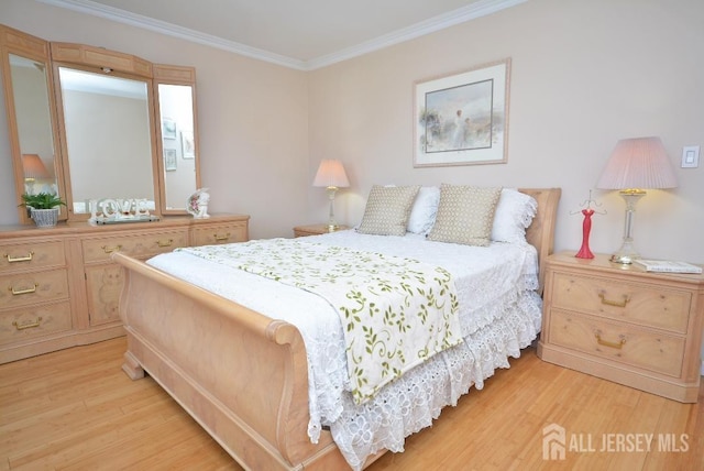 107 N Edward St, Sayreville, NJ 08872 - bedroom with wood finished floors and ornamental molding