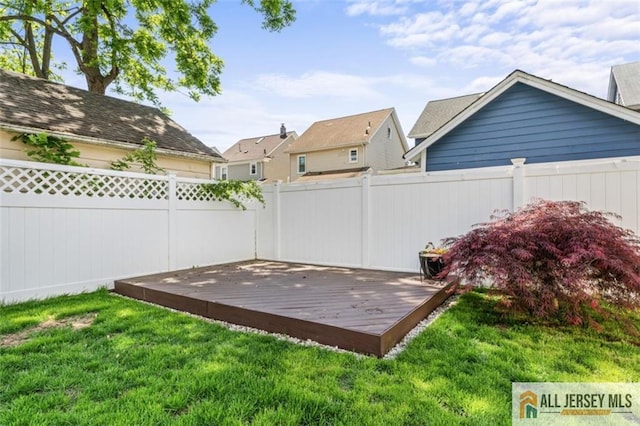 view of yard with a wooden deck