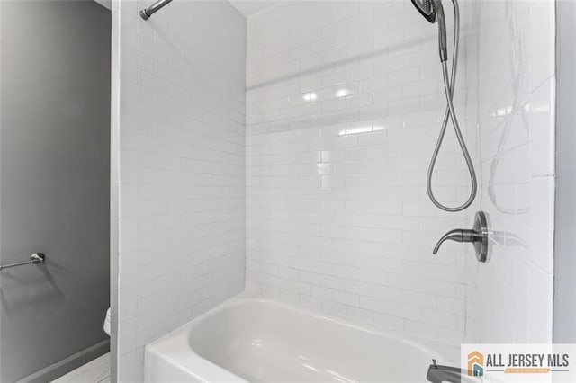 bathroom featuring bathtub / shower combination