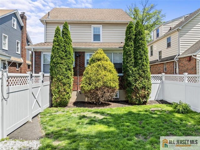 view of front of property featuring brick siding