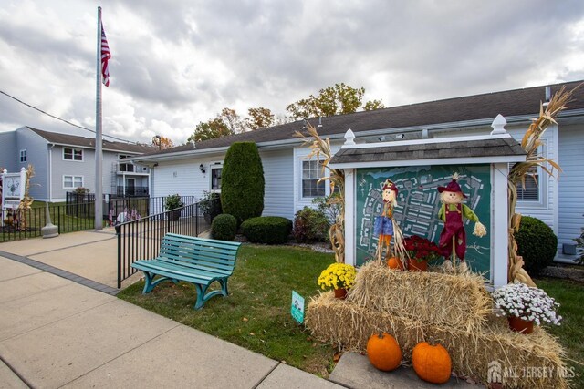 exterior space with a front yard