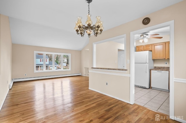 unfurnished living room featuring vaulted ceiling, light wood finished floors, baseboard heating, and ceiling fan with notable chandelier