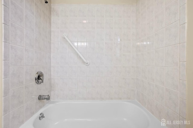 bathroom featuring shower / bath combination