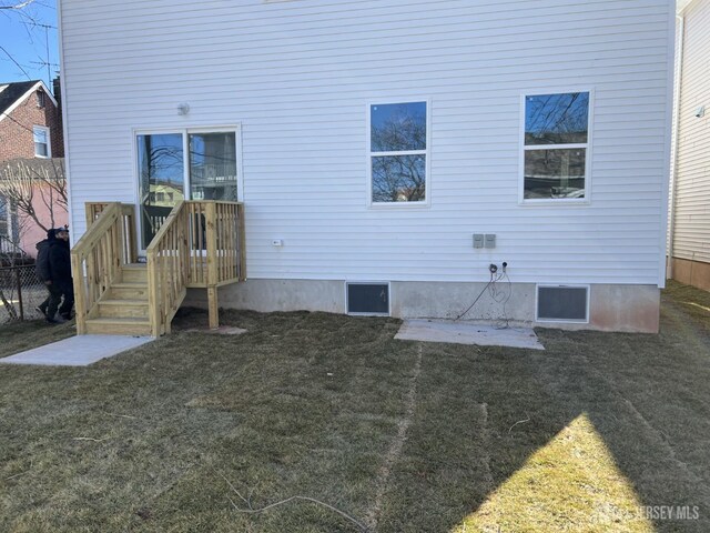 21 Catherine St, Carteret, NJ 07008 - rear view of house featuring fence and a yard