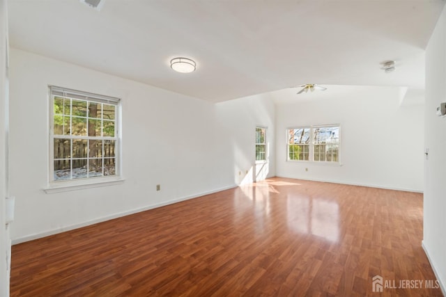 unfurnished living room with hardwood / wood-style floors