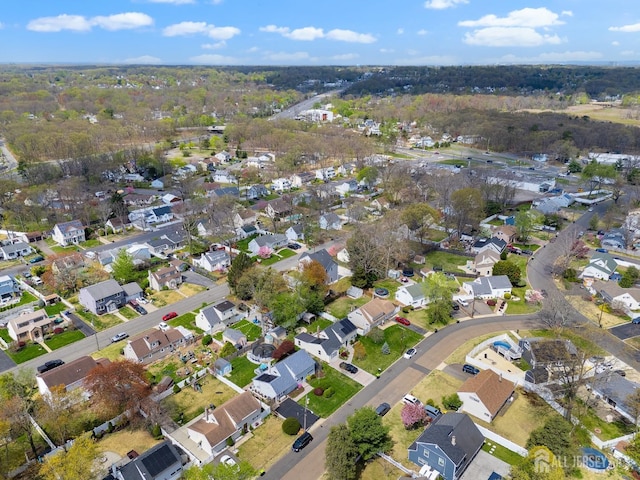 aerial overview of property's location with nearby suburban area