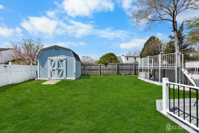 view of yard featuring a shed and an outdoor structure