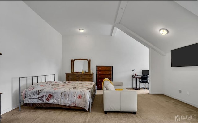 bedroom featuring vaulted ceiling and light carpet