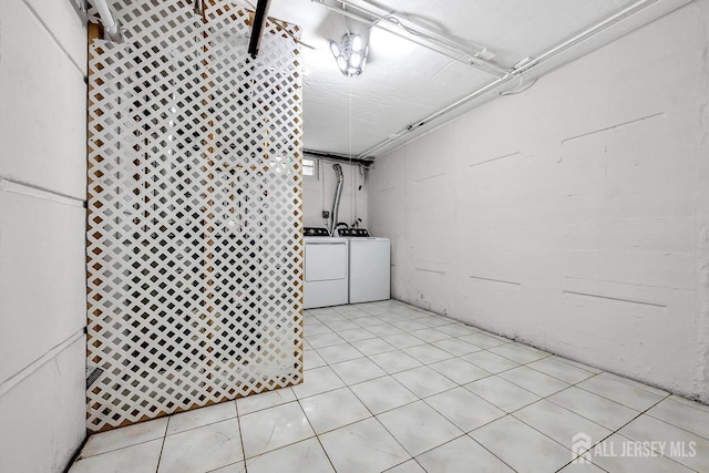 basement featuring washer and dryer