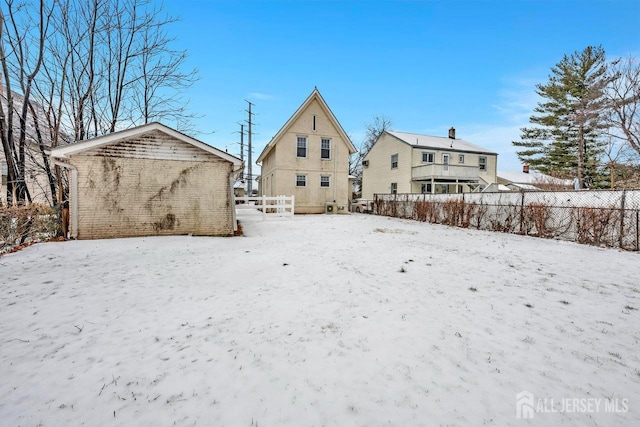 view of snow covered property