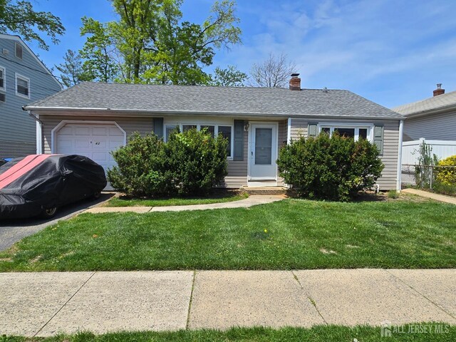 42 Hyde Ave, Iselin, NJ 08830 - ranch-style house with an attached garage, a chimney, and roof with shingles