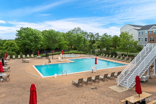 1915 Switzer Ave, Parlin, NJ 08859 - community pool with a patio and view of scattered trees
