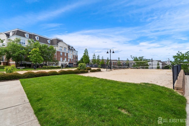 1915 Switzer Ave, Parlin, NJ 08859 - view of property's community with volleyball court and a yard