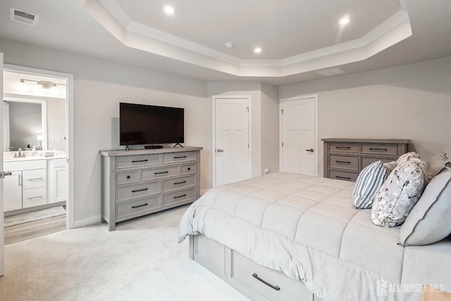 1915 Switzer Ave, Parlin, NJ 08859 - bedroom featuring a raised ceiling, light colored carpet, connected bathroom, baseboards, and a sink