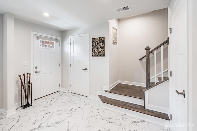 1915 Switzer Ave, Parlin, NJ 08859 - entrance foyer with marble look tile flooring, baseboards, stairway, and recessed lighting