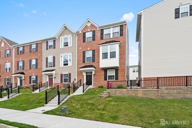 1915 Switzer Ave, Parlin, NJ 08859 - view of property with brick siding and a front lawn