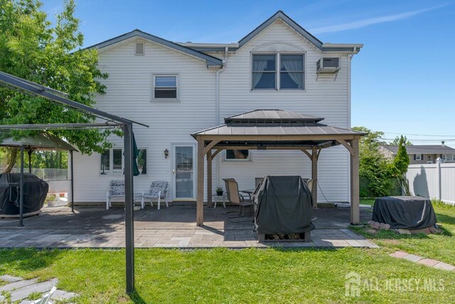 124 6th Ave, Middlesex, NJ 08846 - rear view of property with a gazebo, a patio area, and a wall unit AC