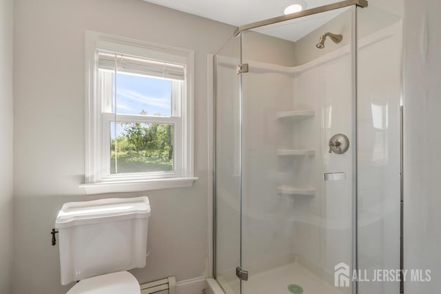124 6th Ave, Middlesex, NJ 08846 - bathroom with baseboard heating, a shower stall, toilet, and baseboards