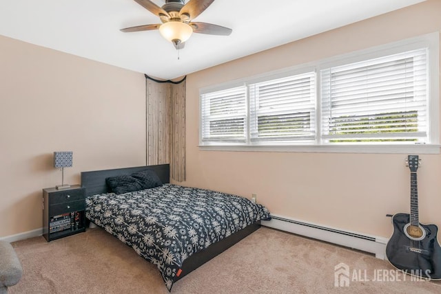 124 6th Ave, Middlesex, NJ 08846 - bedroom with baseboard heating, carpet floors, a ceiling fan, and baseboards
