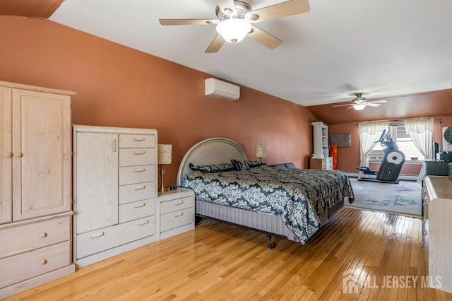 124 6th Ave, Middlesex, NJ 08846 - bedroom with lofted ceiling, an AC wall unit, light wood-style floors, and a ceiling fan