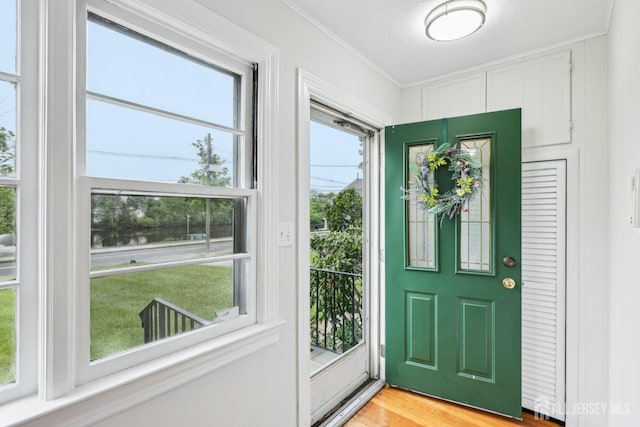 192 Lakeview Ave, Piscataway, NJ 08854 - entryway with ornamental molding and light wood-style flooring