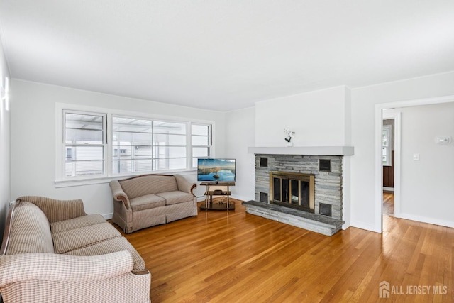 192 Lakeview Ave, Piscataway, NJ 08854 - living area with a fireplace and light wood-style flooring